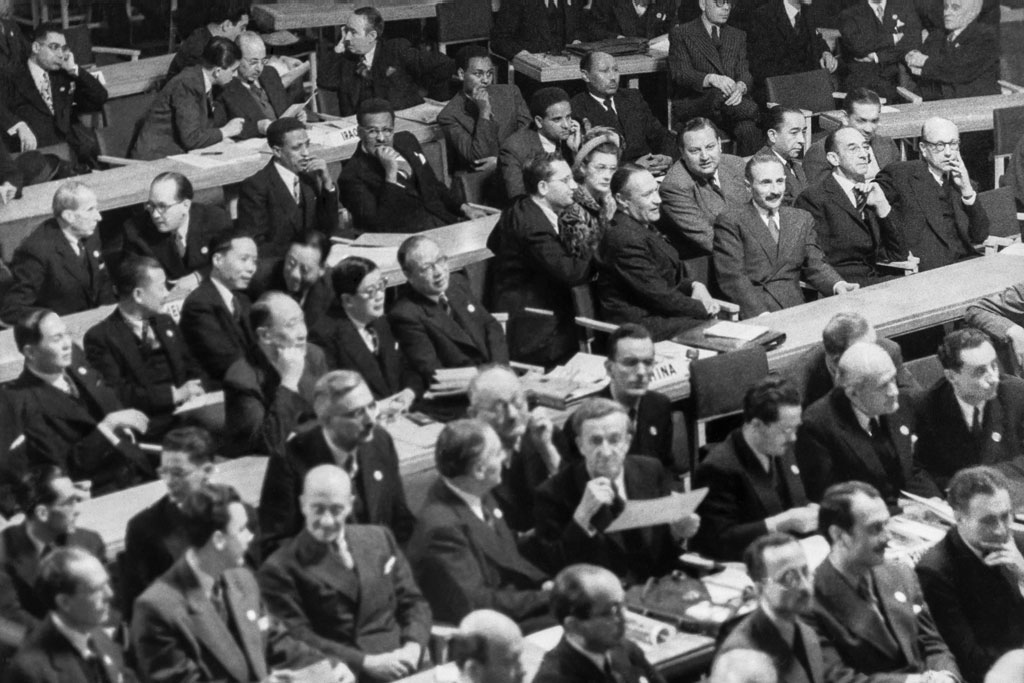 A view of the delegations gathered for the first session of the UN General Assembly when it opened on 10 January 1946 at Central Hall in London, United Kingdom. UN Photo/Marcel Bolomey