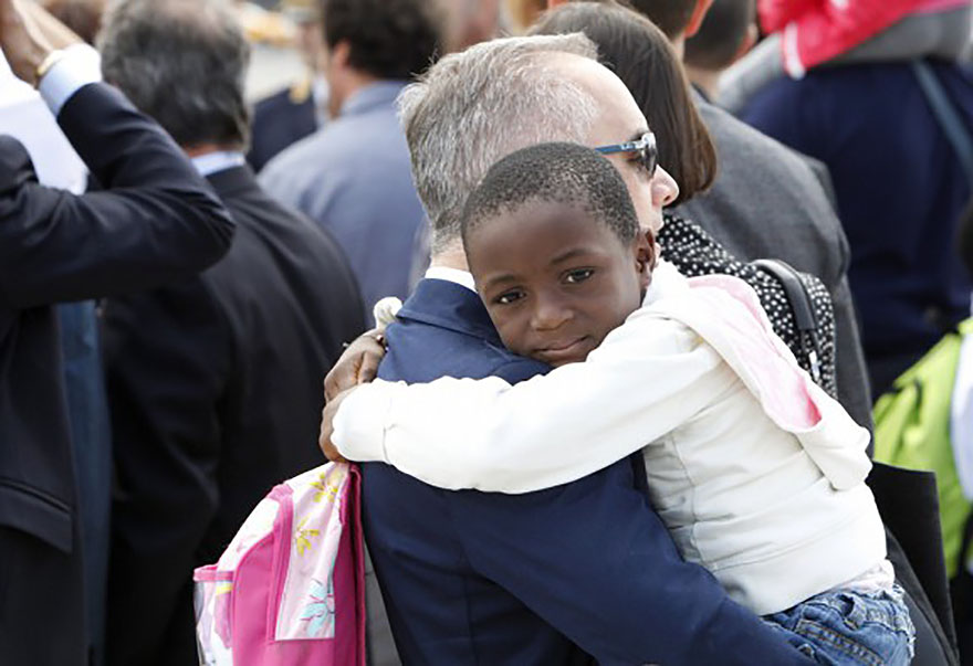 Congolese child with adopted relative in Rome