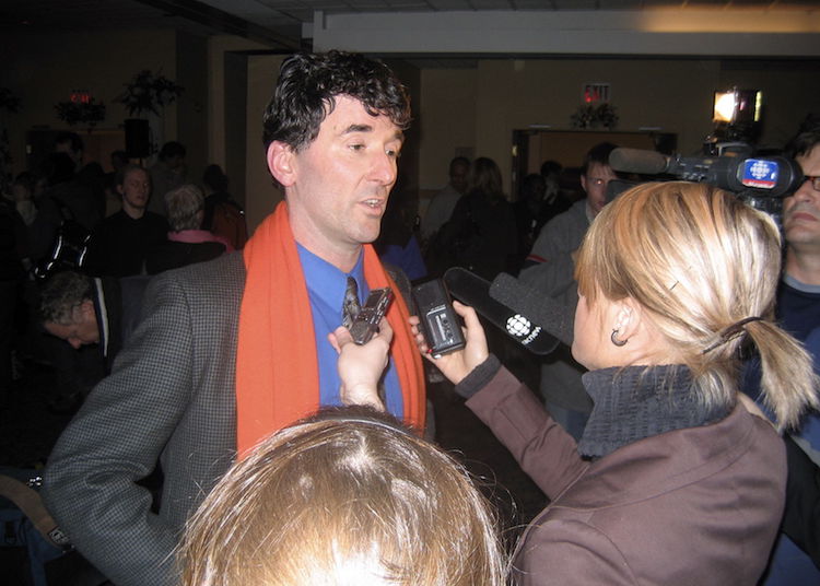 Photo: Paul Dewar, newly elected NDP MP for the riding of Ottawa-Centre at his victory party on January 23, 2006. Source: Wikimedia Commons | Photographer: Thorfinn Stainforth