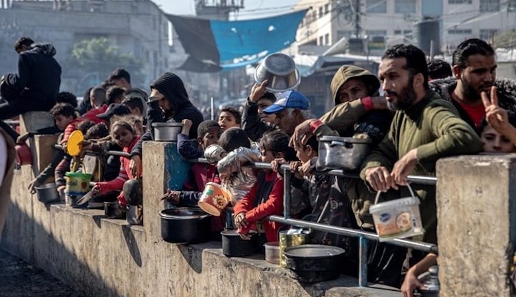 displaced-palestinians-waiting-for-food-distribution.jpg